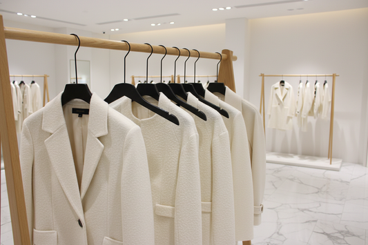 Why Do High-End Brands Always Use Solid Wood Hangers? Here's What We Found