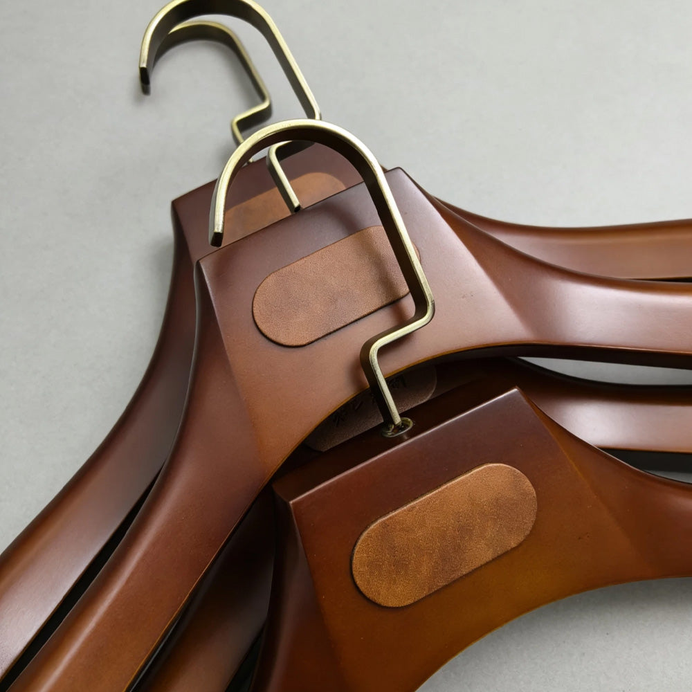 Wholesale Wide Shoulder Plastic Suit Hangers with Trouser Bar | Custom Logo