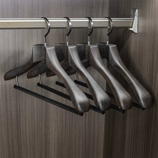 High-end solid wood hangers with no-trace design. Perfect for suits, coats & luxury garments.