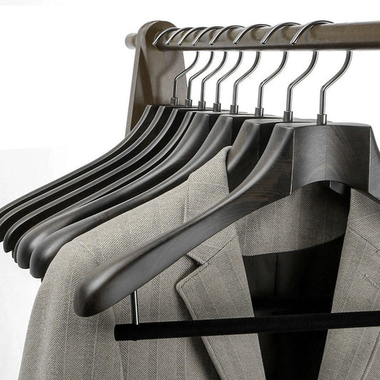 High-end solid wood hangers with no-trace design. Perfect for suits, coats & luxury garments.