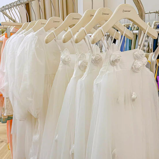 Cream White Wooden Kids Hangers - Non-Slip Lacquered Finish for Children | thegarmenthanger