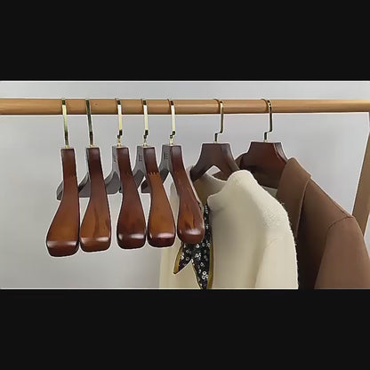 Brown solid wood hangers, gold flat hooks, non-slip serrated design, suitable for clothes and trousers